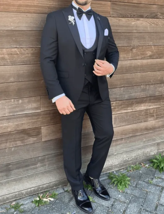 Zwarte tuxedo / smoking met satijnen kraag